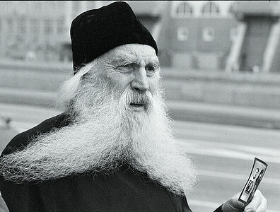 a priest on the March on the anniversary of the execution of Tsar Nicholas ii,Russia  священник на марше в годовщину казни царя Николая II,Россия
